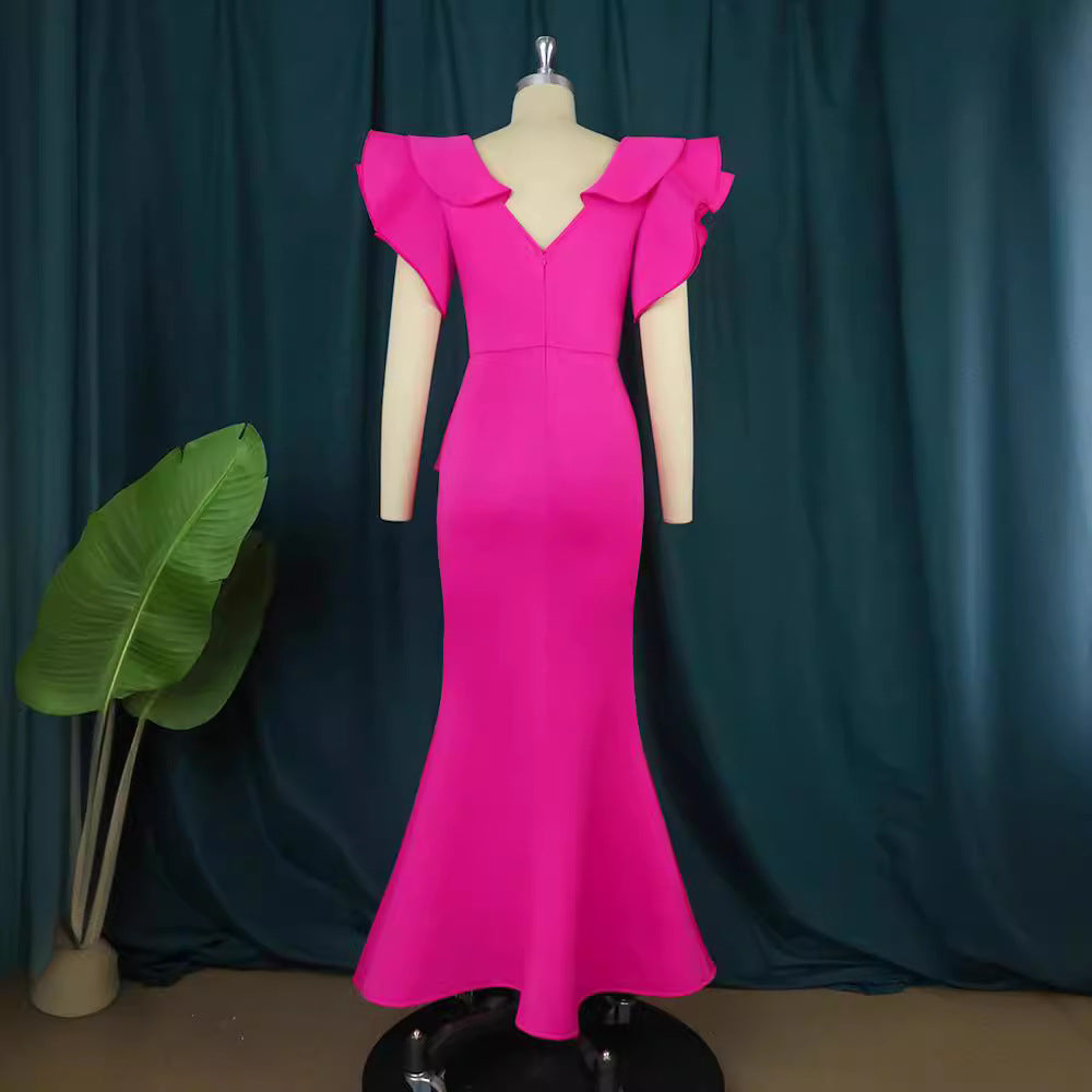 Damer elegant Peplum kvällsklänning med voluminösa ärmar Mirla-Eva Jonsson
