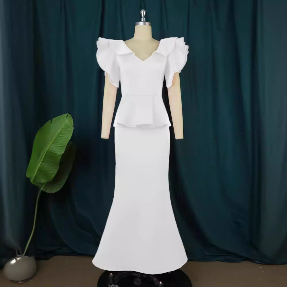 Damer elegant Peplum kvällsklänning med voluminösa ärmar Mirla-Eva Jonsson