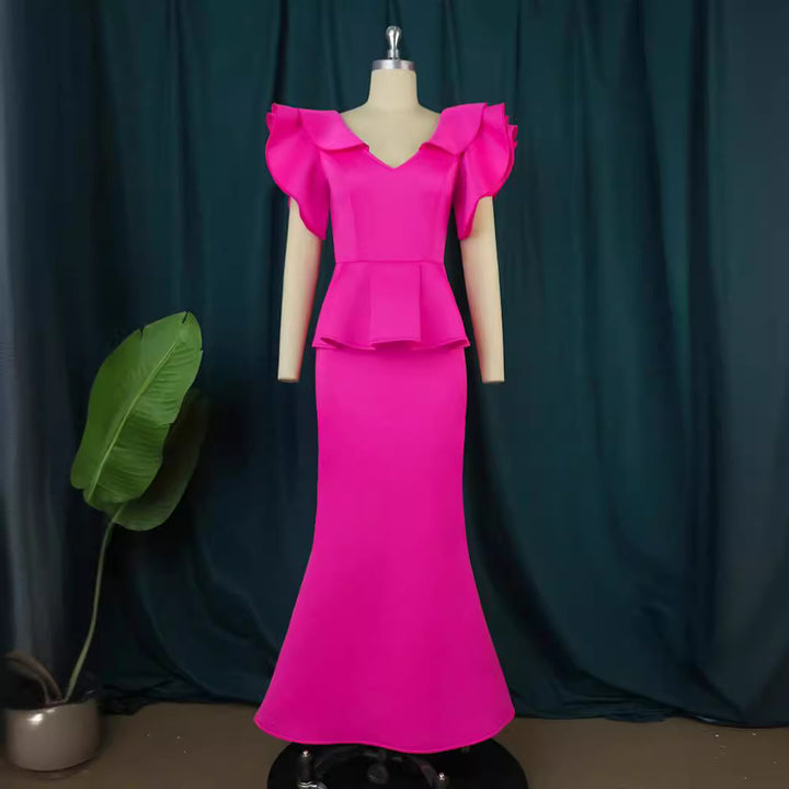 Damer elegant Peplum kvällsklänning med voluminösa ärmar Mirla-Eva Jonsson