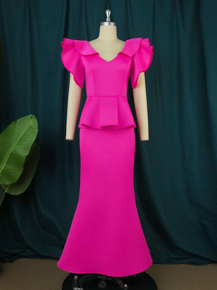 Damer elegant Peplum kvällsklänning med voluminösa ärmar Mirla-Eva Jonsson