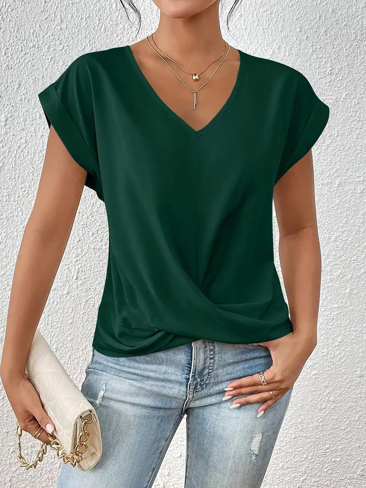 Damer elegant V-halsblus med avslappnad drapering Mirla-Eva Jonsson