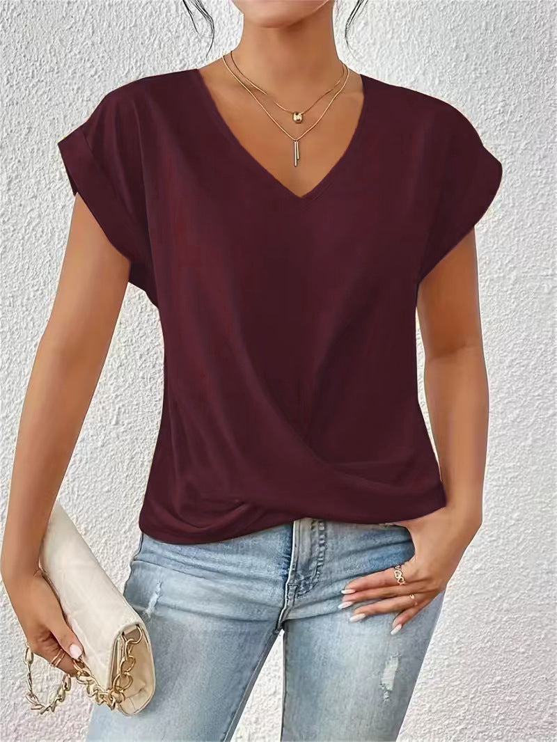 Damer elegant V-halsblus med avslappnad drapering Mirla-Eva Jonsson