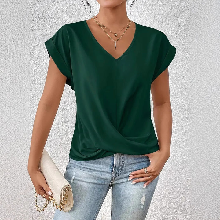 Damer elegant V-halsblus med avslappnad drapering Mirla-Eva Jonsson