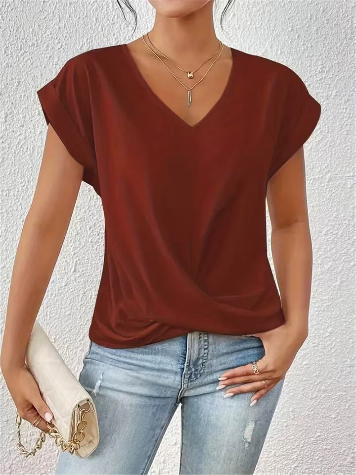 Damer elegant V-halsblus med avslappnad drapering Mirla-Eva Jonsson