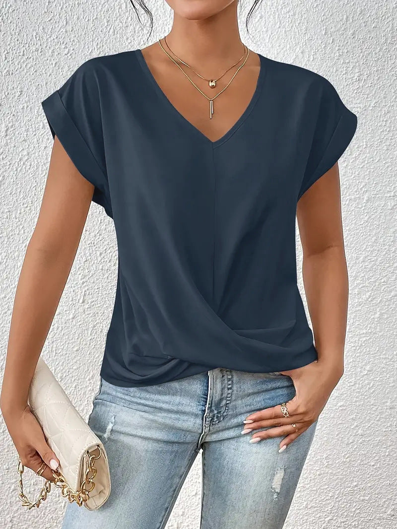 Damer elegant V-halsblus med avslappnad drapering Mirla-Eva Jonsson