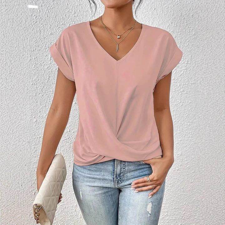 Damer elegant V-halsblus med avslappnad drapering Mirla-Eva Jonsson