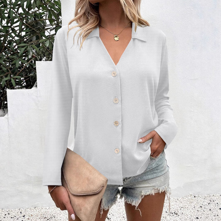 Damer elegant V-utsnitt blus med knappdetaljer Mirla-Eva Jonsson