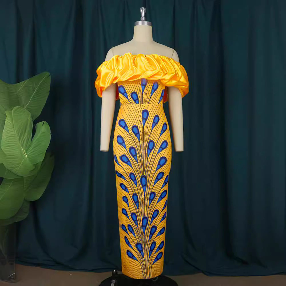 Damer elegant aftenkjole med skulderfri design og voluminøst flæsekant Mirla-Eva Jonsson