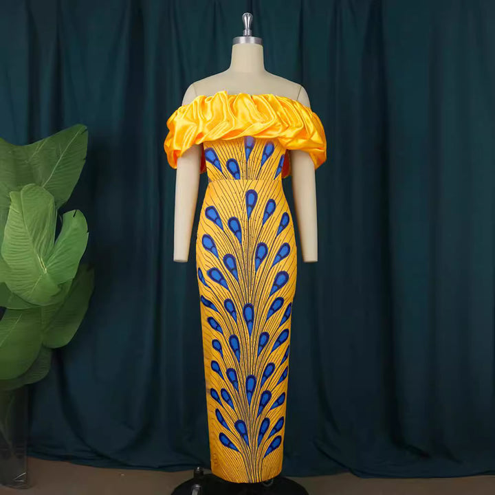 Damer elegant aftenkjole med skulderfri design og voluminøst flæsekant Mirla-Eva Jonsson