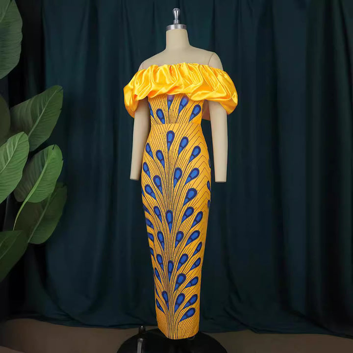 Damer elegant aftenkjole med skulderfri design og voluminøst flæsekant Mirla-Eva Jonsson