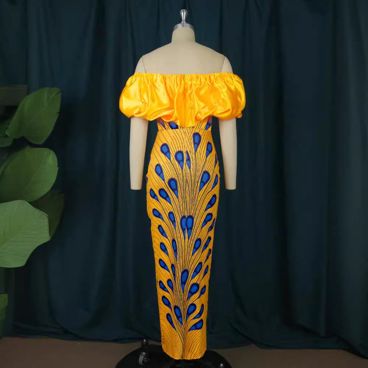 Damer elegant aftenkjole med skulderfri design og voluminøst flæsekant Mirla-Eva Jonsson