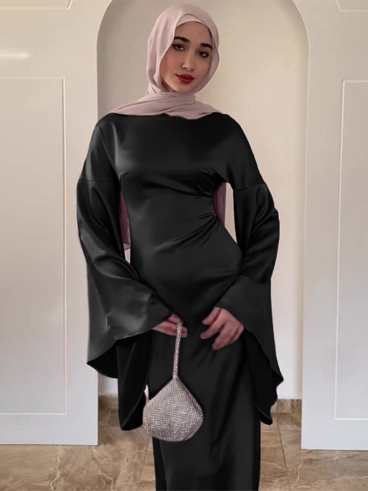Damer elegant aftenkjole med vid ærme og flydende snit Mirla-Eva Jonsson