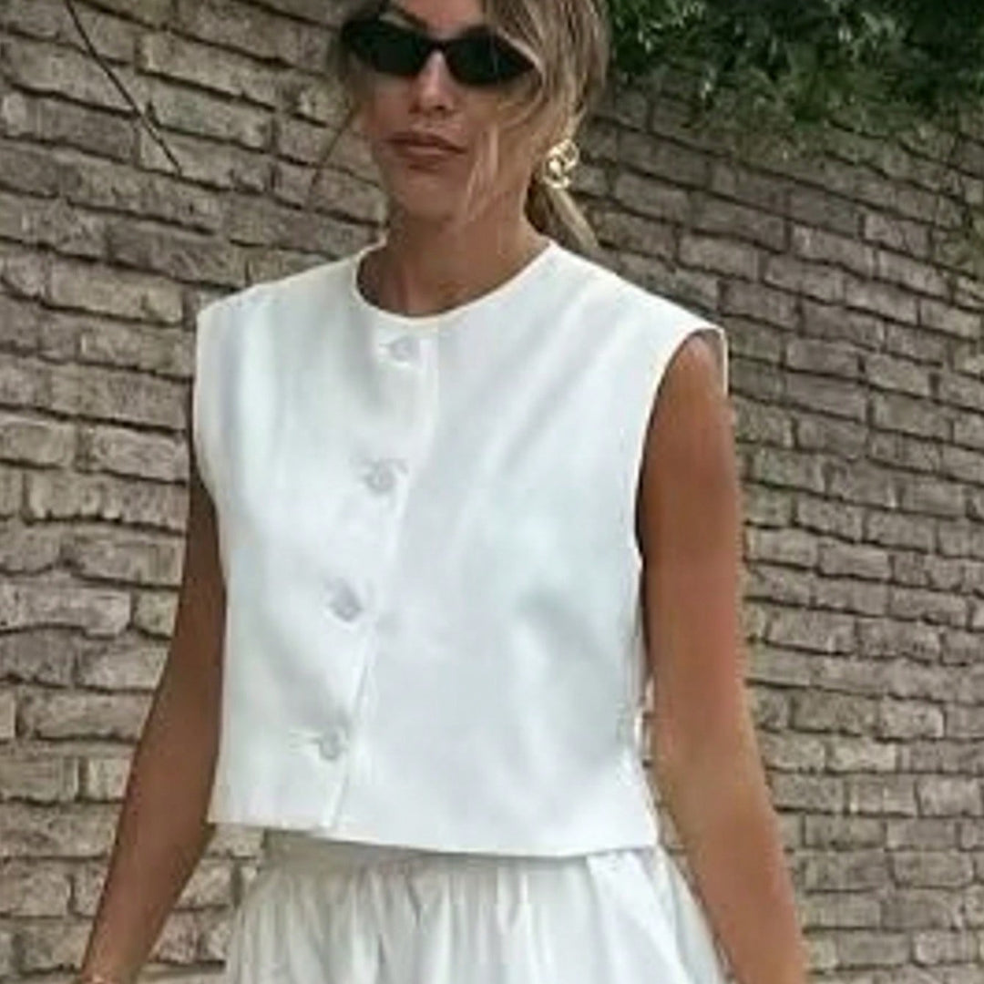 Damer elegant ärmlös väst med knapplayouter Mirla-Eva Jonsson