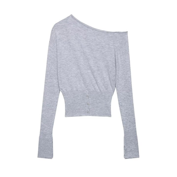 Damer elegant asymmetrisk långärmad topp med knapppdetail Mirla-Eva Jonsson