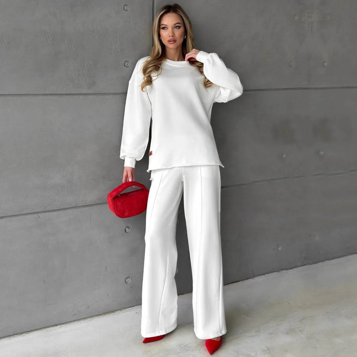 Damer elegant, avslappnad tvådelad outfit med vida byxor och oversized sweatshirt Mirla-Eva Jonsson