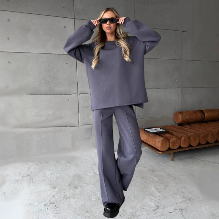 Damer elegant, avslappnad tvådelad outfit med vida byxor och oversized sweatshirt Mirla-Eva Jonsson