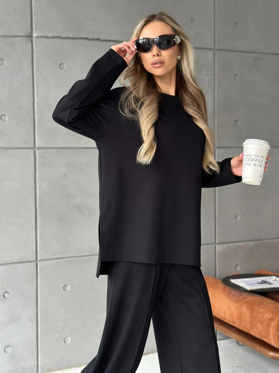 Damer elegant, avslappnad tvådelad outfit med vida byxor och oversized sweatshirt Mirla-Eva Jonsson