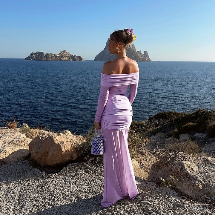 Damer elegant axelbandlöst maxiklänning med raffinerade draperingsdetaljer Mirla-Eva Jonsson