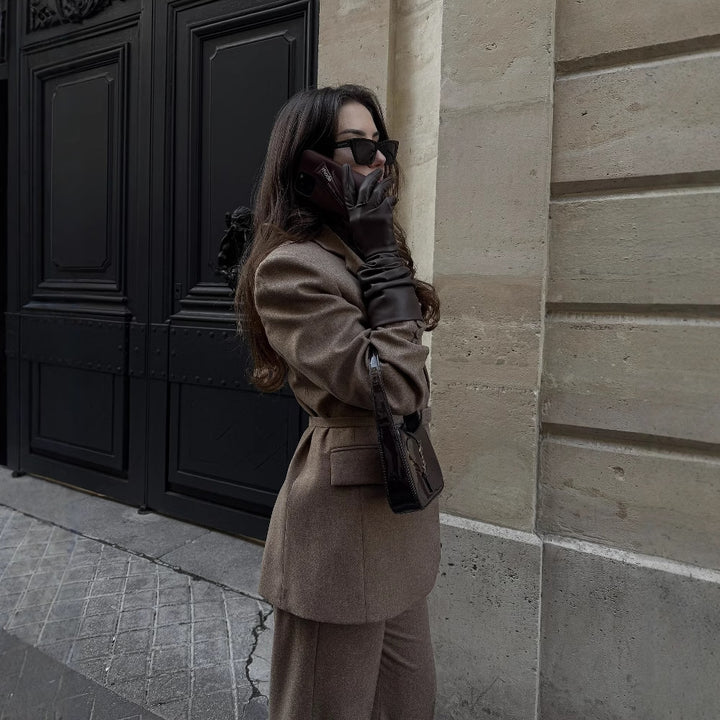 Damer elegant blazer med bälte och strukturerad tyg Mirla-Eva Jonsson