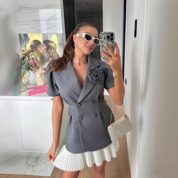 Damer elegant blazer med puffärmar och blommig detalj Mirla-Eva Jonsson