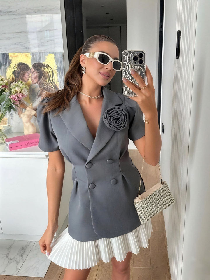 Damer elegant blazer med puffärmar och blommig detalj Mirla-Eva Jonsson