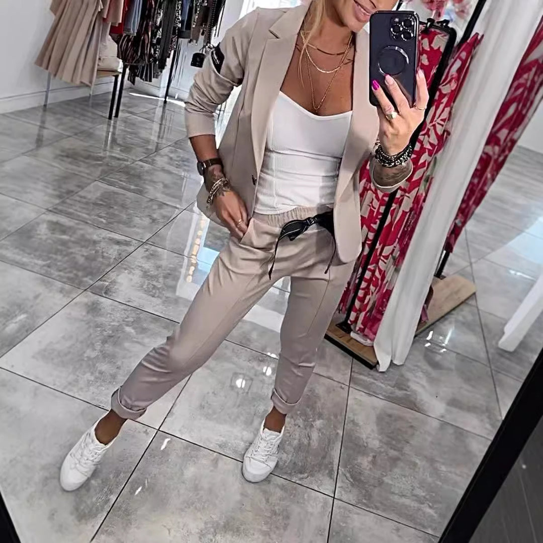 Damer elegant blazer-set med praktiska fickor och flexibel midjesnörning Mirla-Eva Jonsson