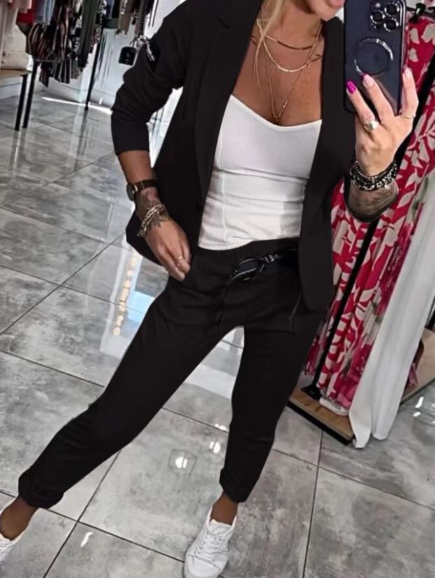 Damer elegant blazer-set med praktiska fickor och flexibel midjesnörning Mirla-Eva Jonsson
