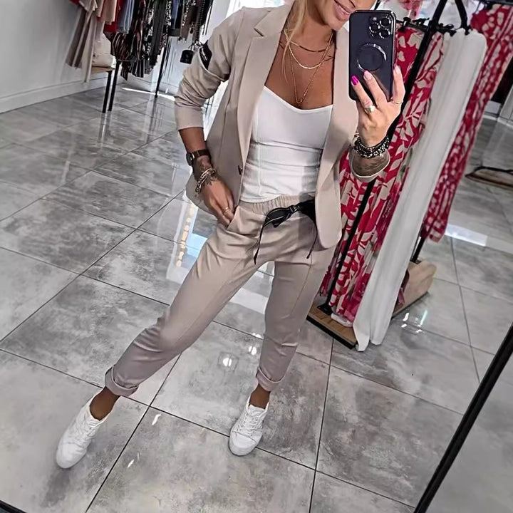 Damer elegant blazer-set med praktiska fickor och flexibel midjesnörning Mirla-Eva Jonsson