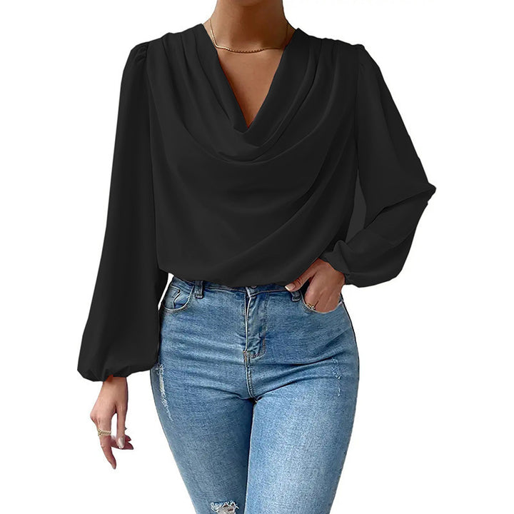 Damer elegant blus med asymmetrisk halsringning och långa ärmar Mirla-Eva Jonsson