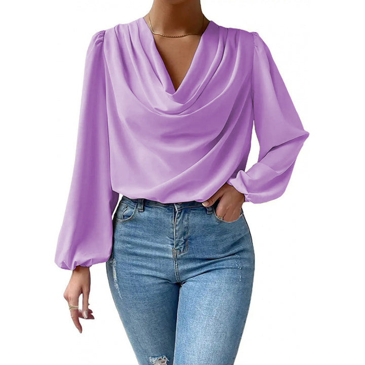 Damer elegant blus med asymmetrisk halsringning och långa ärmar Mirla-Eva Jonsson
