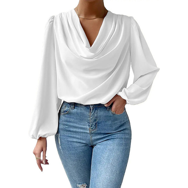 Damer elegant blus med asymmetrisk halsringning och vida ärmar Mirla-Eva Jonsson