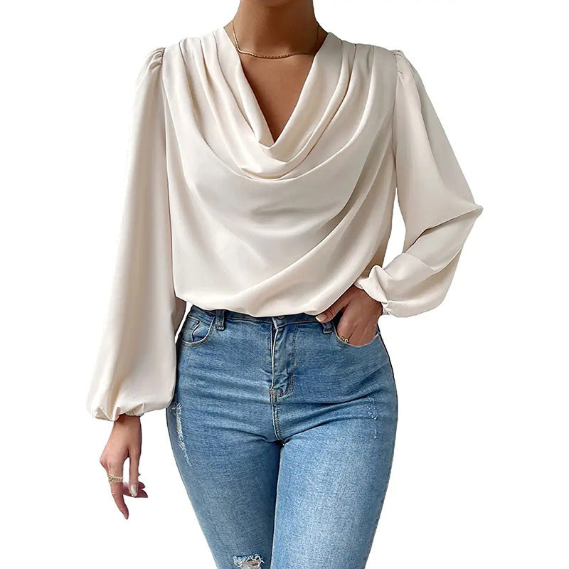 Damer elegant blus med asymmetrisk halsringning och vida ärmar Mirla-Eva Jonsson