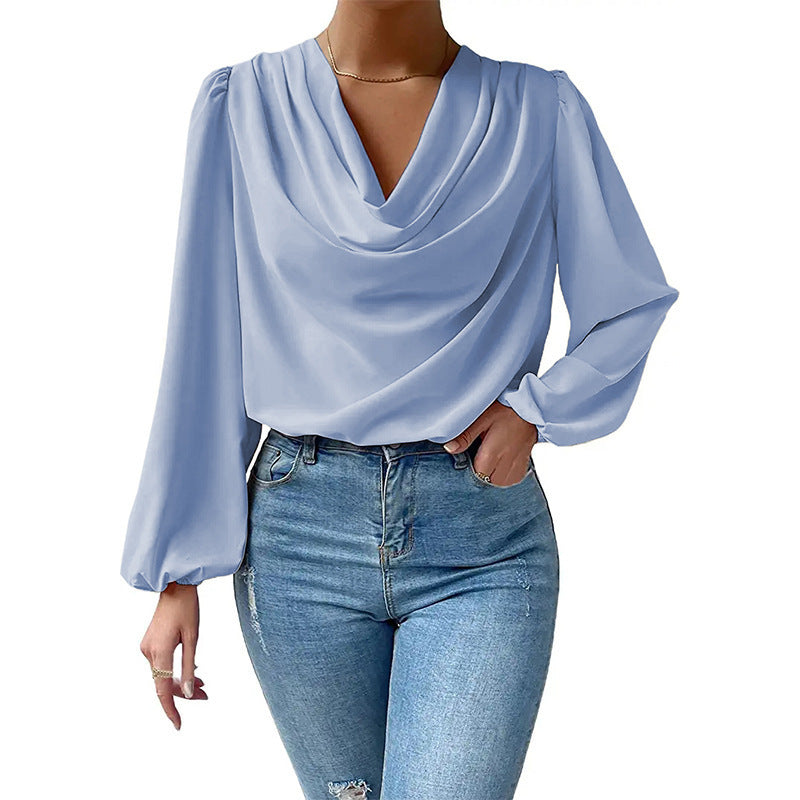 Damer elegant blus med asymmetrisk halsringning och vida ärmar Mirla-Eva Jonsson