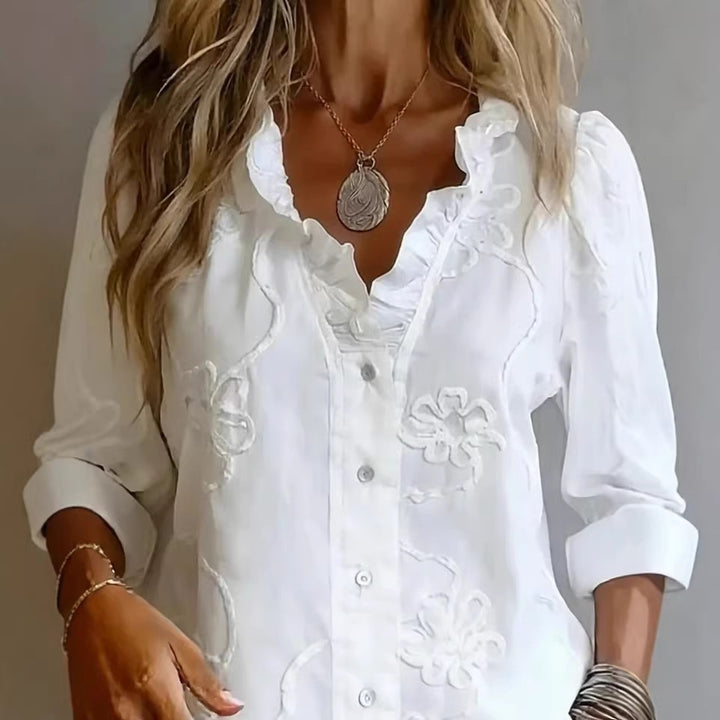 Damer elegant blus med blommiga broderier och voluminösa ärmar Mirla-Eva Jonsson