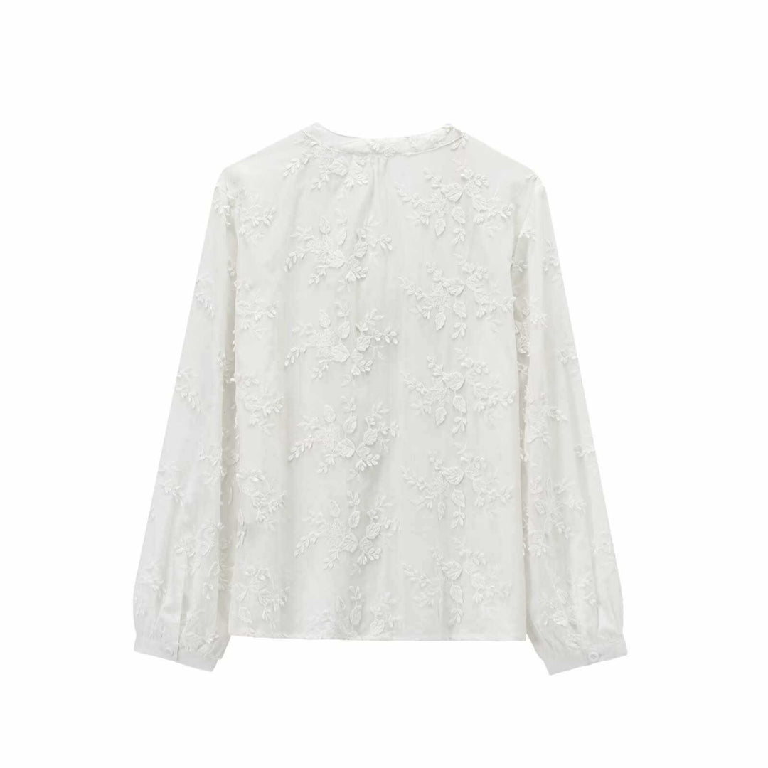 Damer elegant blus med blommigt broderidesign Mirla-Eva Jonsson