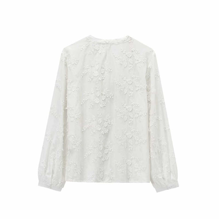Damer elegant blus med blommigt broderidesign Mirla-Eva Jonsson