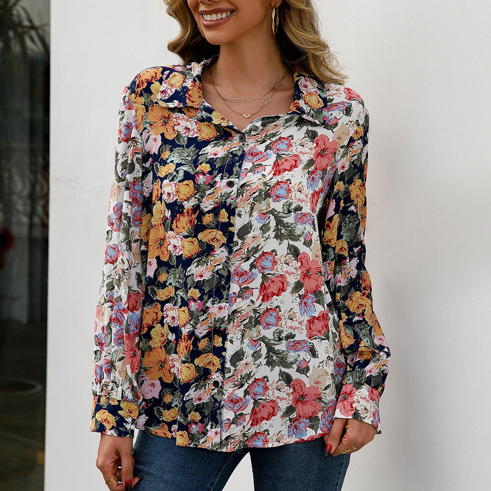 Damer elegant blus med blommönster och knapppdetaljer Eva Jonsson-Eva Jonsson