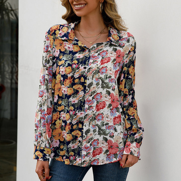 Damer elegant blus med blommönster och knapppdetaljer Eva Jonsson-Eva Jonsson
