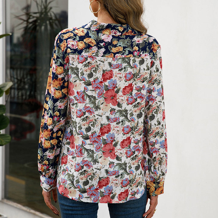 Damer elegant blus med blommönster och knapppdetaljer Eva Jonsson-Eva Jonsson