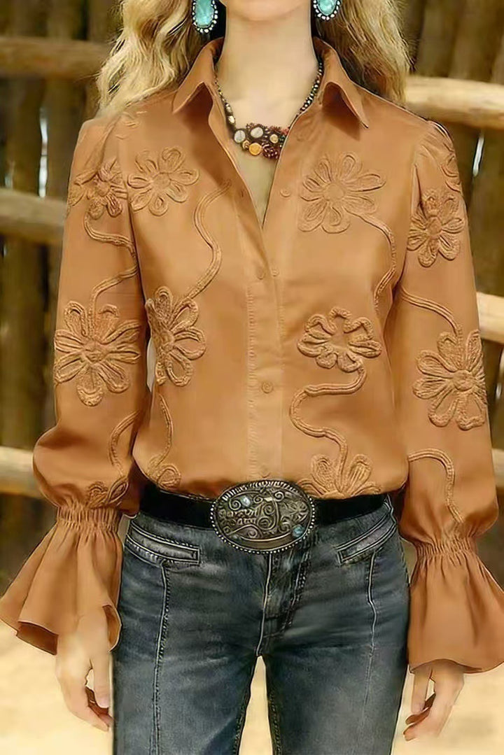 Damer elegant blus med blommönstrad broderi och voluminösa ärmar Mirla-Eva Jonsson