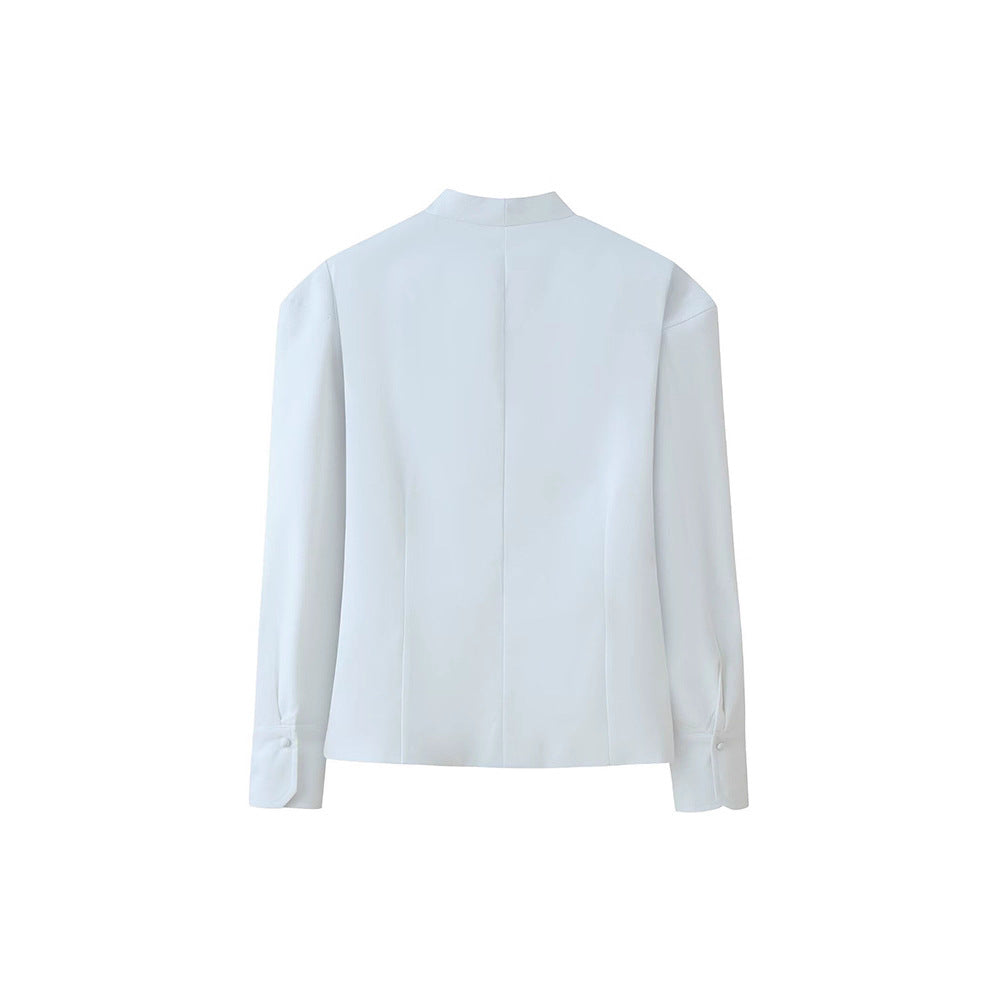 Damer elegant blus med breda slag och dekorativa knappdetaljer Mirla-Eva Jonsson