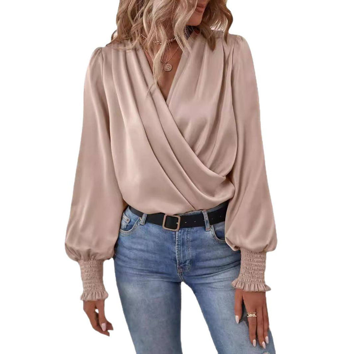 Damer elegant blus med draperad design och smala ärmar Mirla-Eva Jonsson
