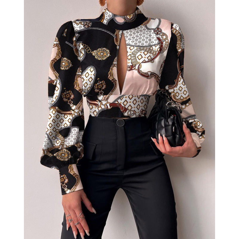 Damer elegant blus med en raffinerad nyckelhålsringning och voluminösa ärmar Mirla-Eva Jonsson