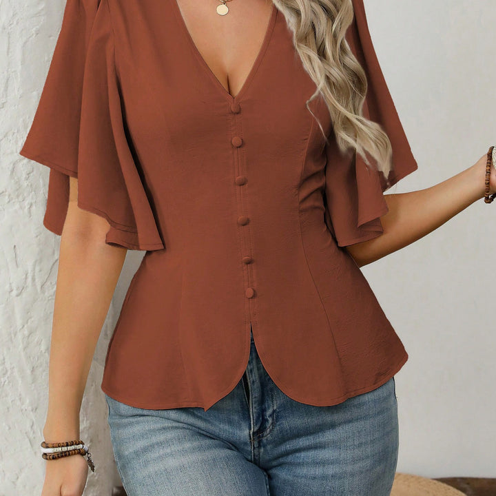 Damer elegant blus med klockärmar och knapppdetail Mirla-Eva Jonsson