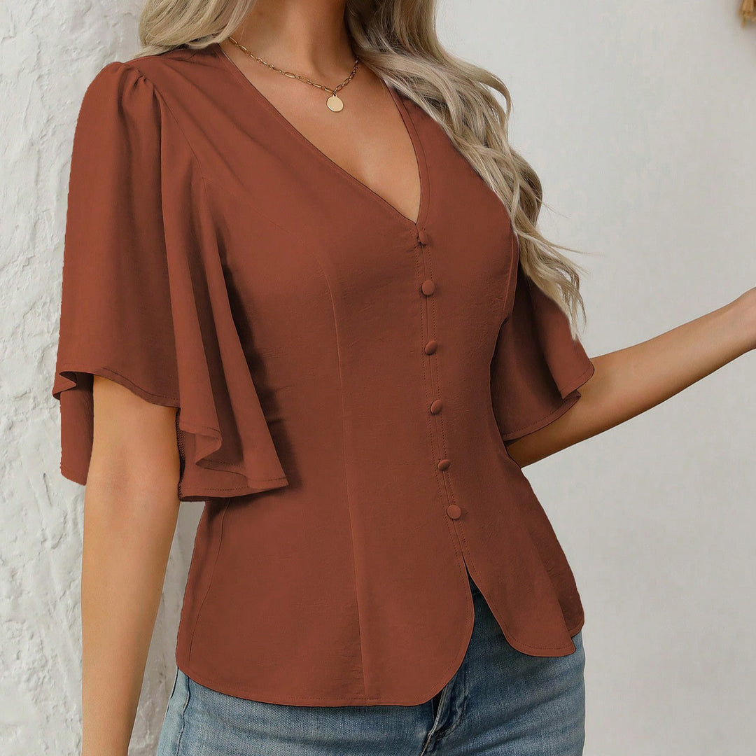 Damer elegant blus med klockärmar och knapppdetail Mirla-Eva Jonsson