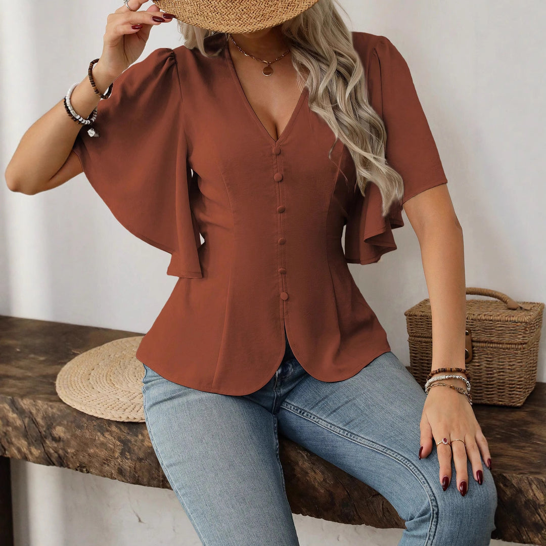 Damer elegant blus med klockärmar och knapppdetail Mirla-Eva Jonsson