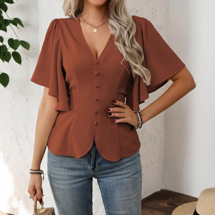 Damer elegant blus med klockärmar och knapppdetail Mirla-Eva Jonsson