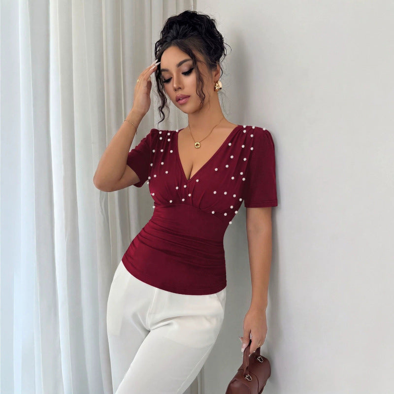 Damer elegant blus med pärldetalj Mirla-Eva Jonsson