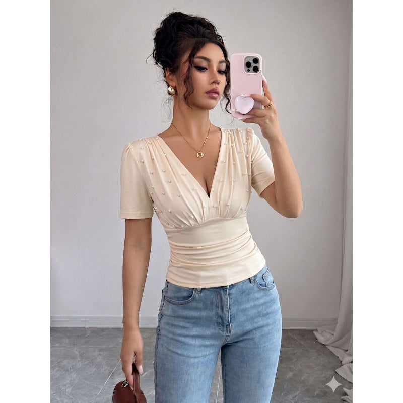 Damer elegant blus med pärldetalj Mirla-Eva Jonsson