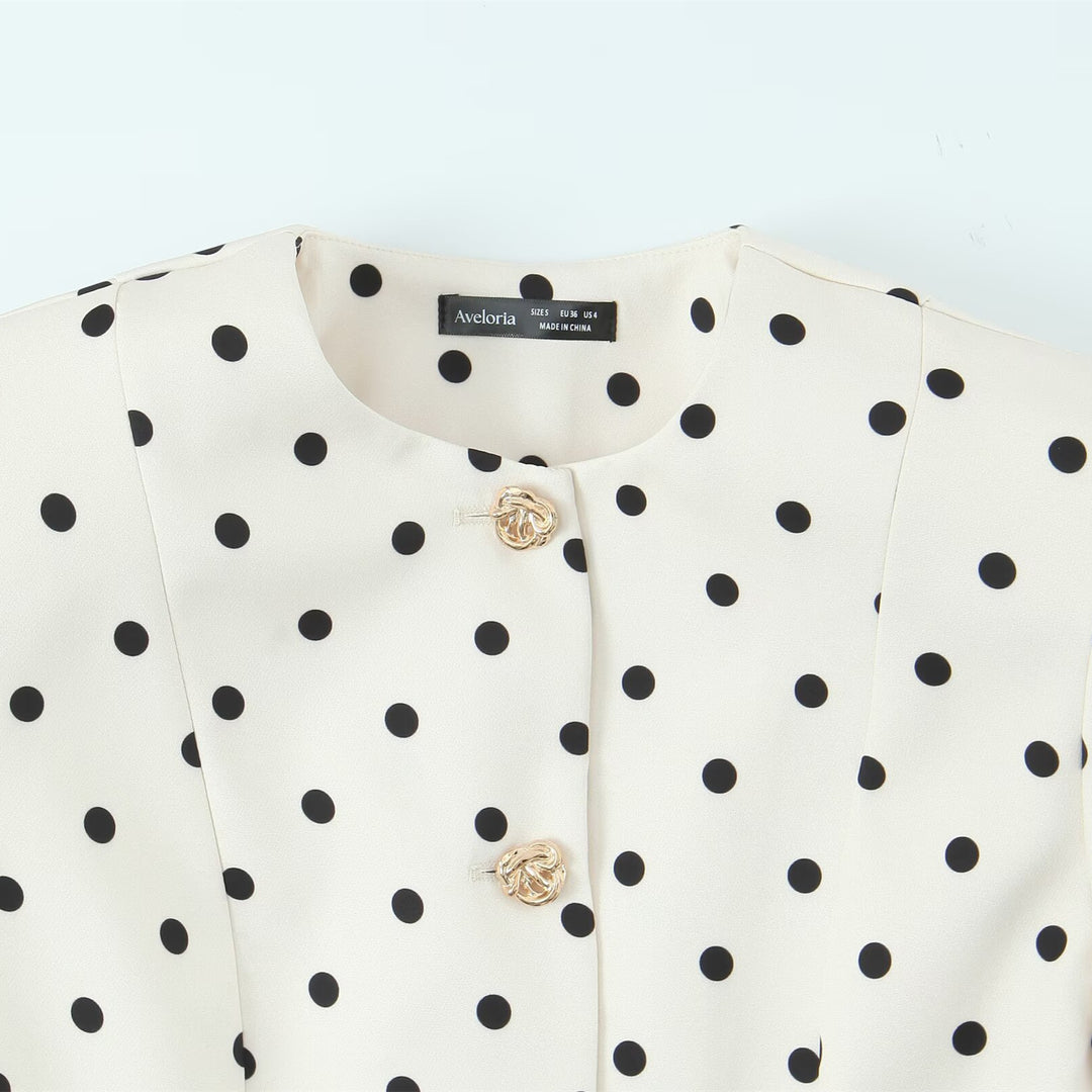 Damer elegant blus med puffärmar och knapppdetaljer Mirla-Eva Jonsson